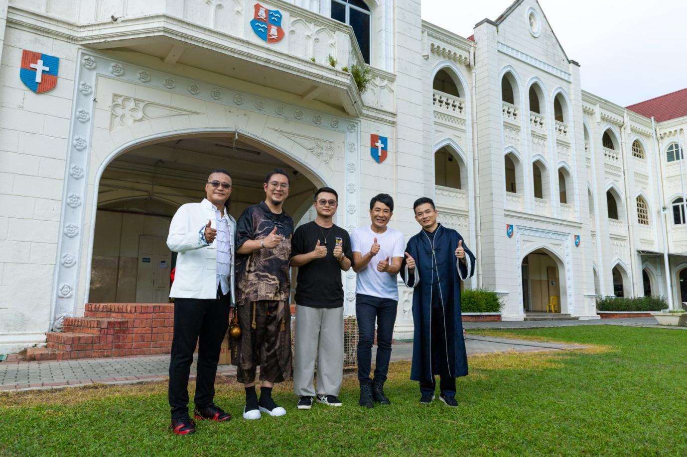 A group of men standing in front of a building
AI-generated content may be incorrect.